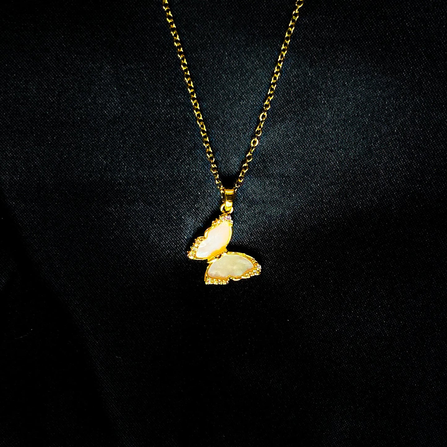 Gold Butterfly Necklace with Pink Stone Inlay