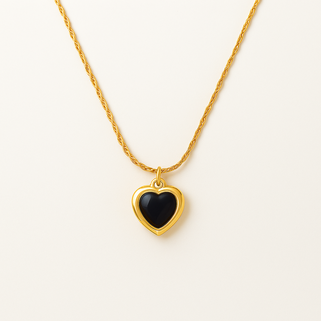Adore You Black necklace with a black heart pendant on a white background