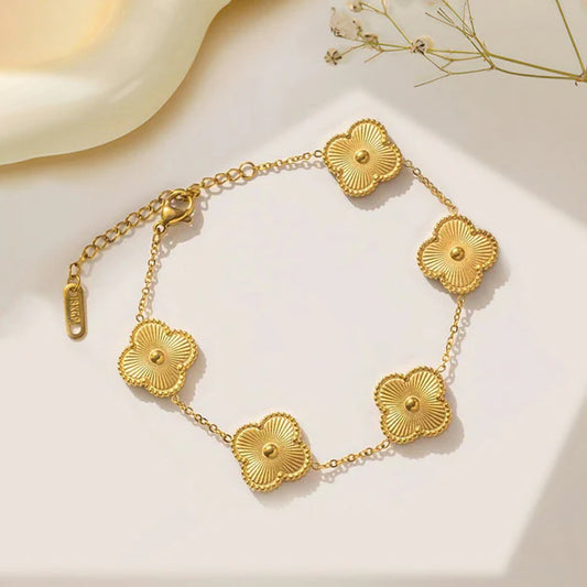 Gold clover Bracelet by everray on a light background