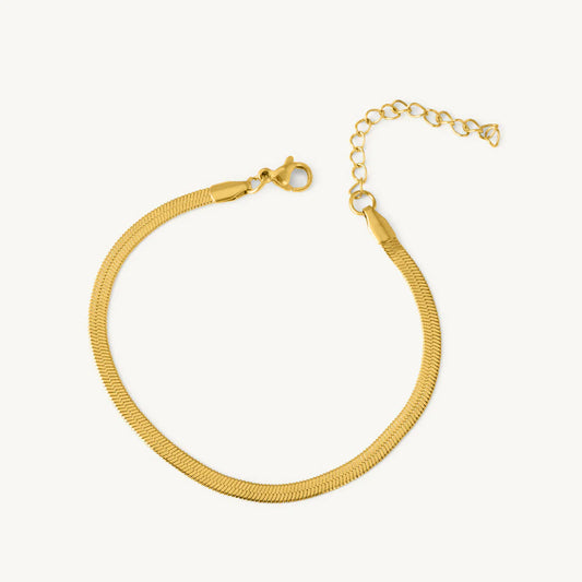 Gold Snake Chain bracelet on a white background