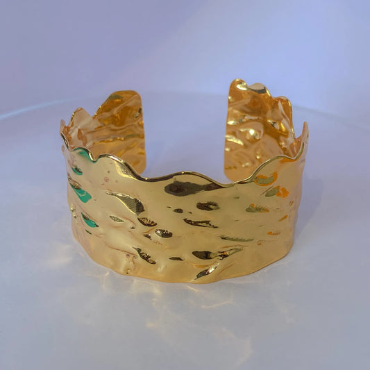 Wavy Cuff Bracelet By Everray with a textured surface on a white background
