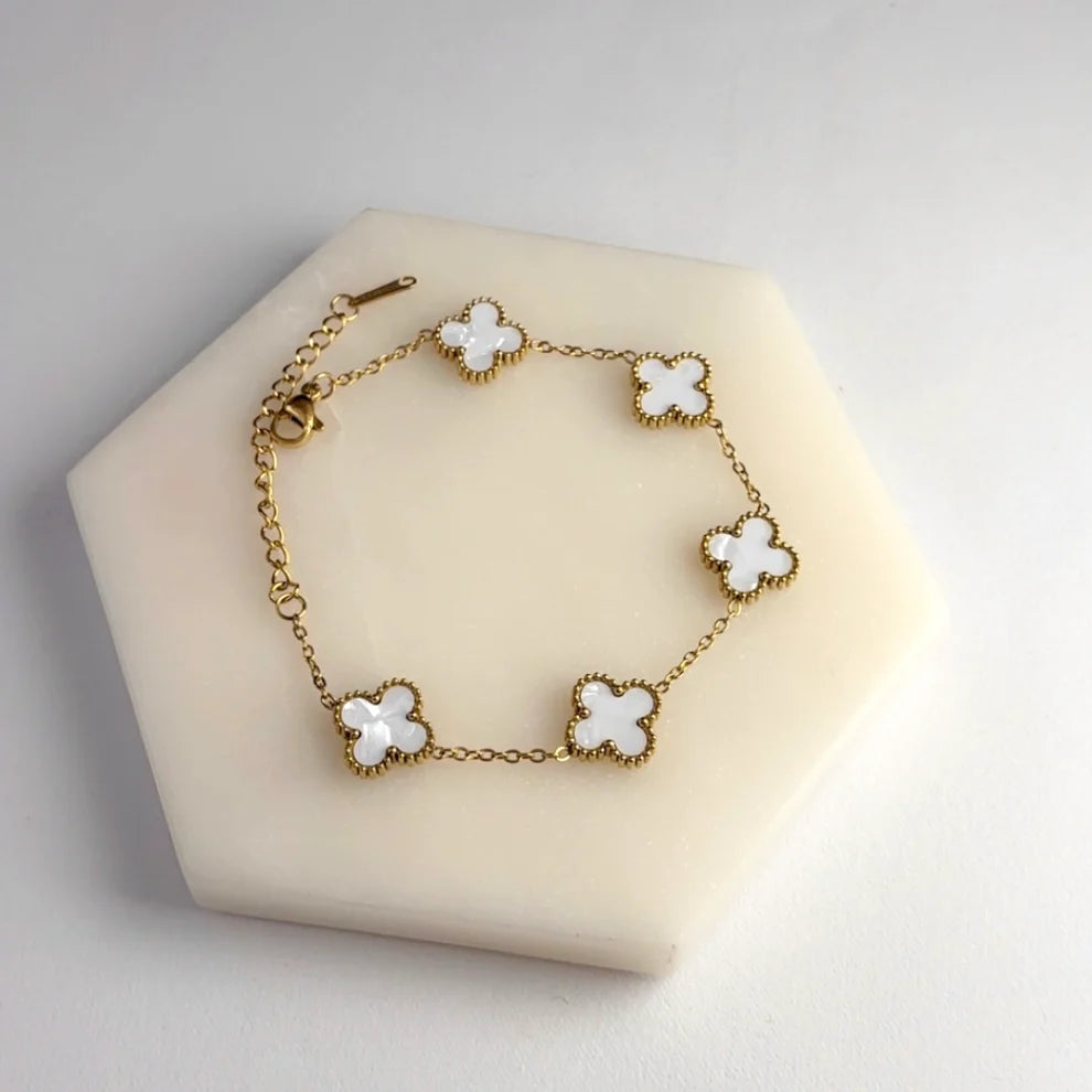 3 in 1 Reversible Clover Bracelet B/W by everray on a beige stand