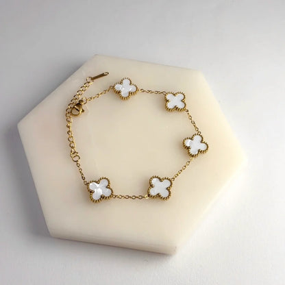 3 in 1 Reversible Clover Bracelet B/W by everray on a beige stand