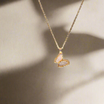 Gold Butterfly Necklace with Pink Stone Inlay