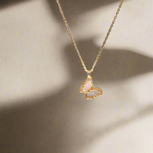 Gold Butterfly Necklace with Pink Stone Inlay