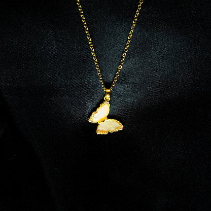 Gold Butterfly Necklace with Pink Stone Inlay