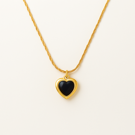 Adore You Black necklace with a black heart pendant on a white background