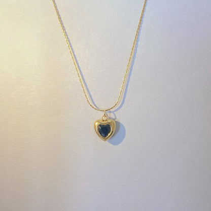  Adore You Black Necklace with a heart-shaped pendant on a light background