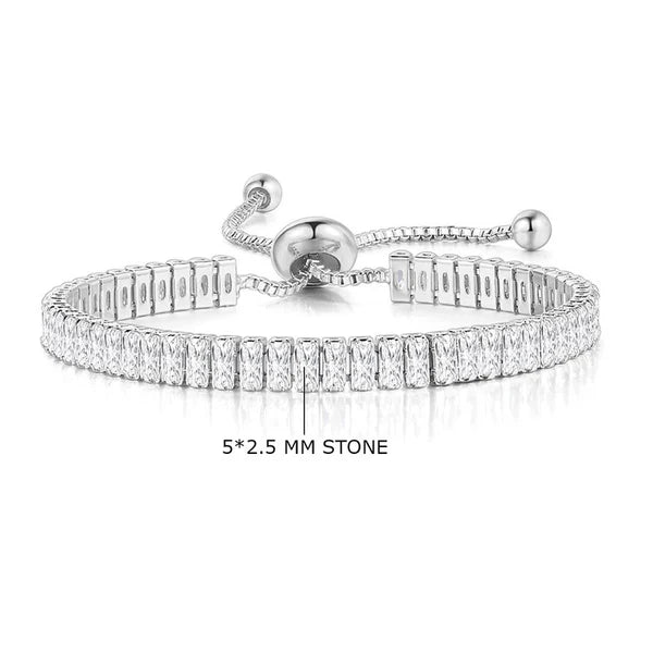 Silver bracelet with clear stones on a white background