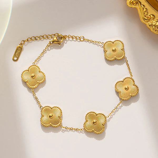 Gold clover Bracelet by everray on a white background