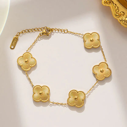 Gold clover Bracelet by everray on a white background