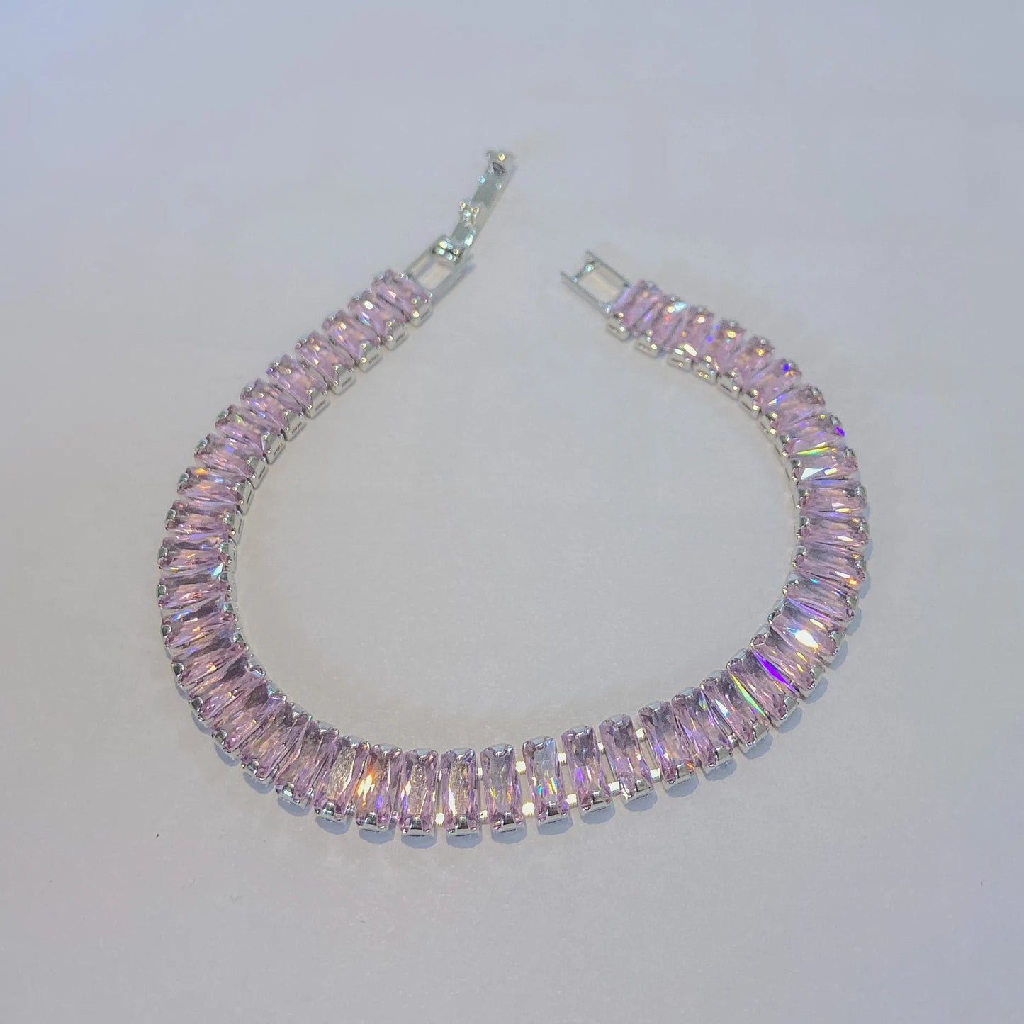 Pink SIlver tennis bracelet By everray on a light gray background