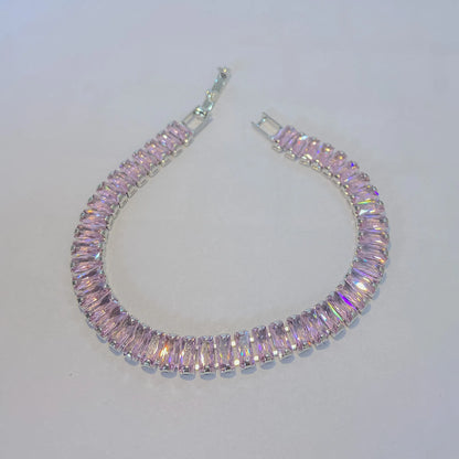 Pink SIlver tennis bracelet By everray on a light gray background