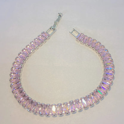 Pink SIlver tennis bracelet By everray on a light gray background